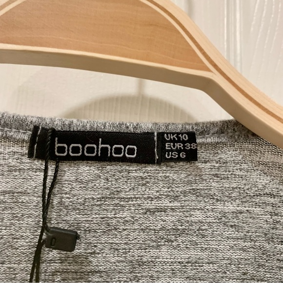 BOHOOR Gray Long Sleeve Wrap Top
Size 6. With tag. - Picture 4 of 6